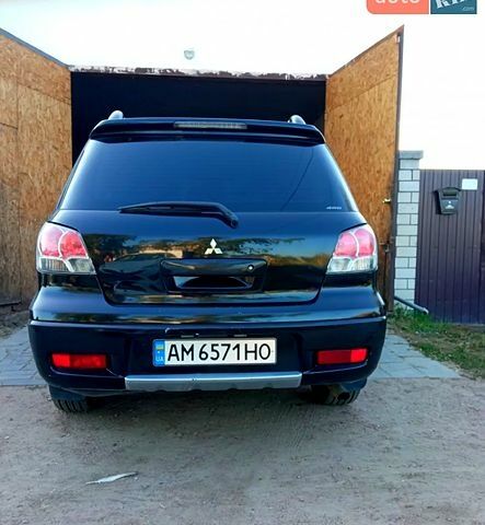 Чорний Міцубісі Аутлендер, об'ємом двигуна 2 л та пробігом 0 тис. км за 4600 $, фото 3 на Automoto.ua