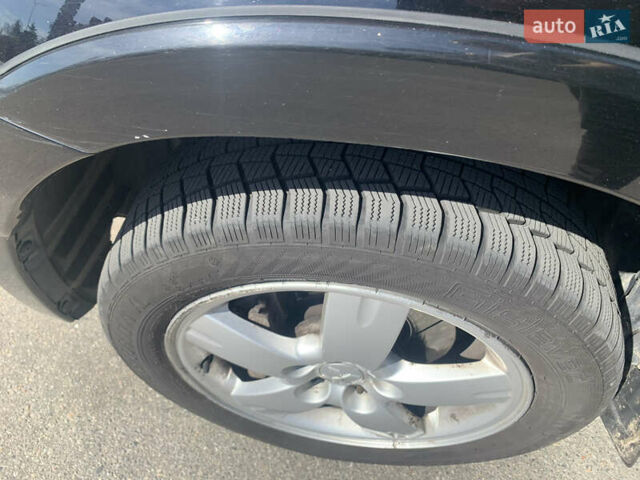 Черный Мицубиси Аутлендер, объемом двигателя 2 л и пробегом 212 тыс. км за 6000 $, фото 35 на Automoto.ua