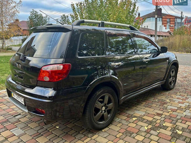 Чорний Міцубісі Аутлендер, об'ємом двигуна 2.38 л та пробігом 247 тис. км за 5499 $, фото 26 на Automoto.ua