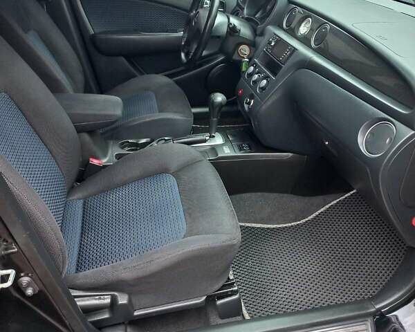 Черный Мицубиси Аутлендер, объемом двигателя 2.4 л и пробегом 256 тыс. км за 6900 $, фото 8 на Automoto.ua