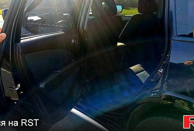 Черный Мицубиси Аутлендер, объемом двигателя 2.4 л и пробегом 265 тыс. км за 7500 $, фото 9 на Automoto.ua