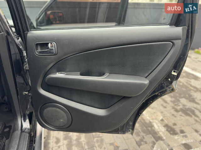 Черный Мицубиси Аутлендер, объемом двигателя 2.4 л и пробегом 242 тыс. км за 6800 $, фото 46 на Automoto.ua