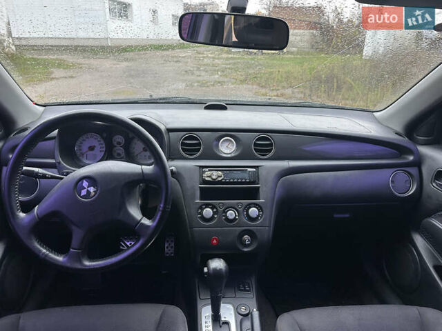 Міцубісі Аутлендер 2006 у Василькове на Automoto.ua Чорний Міцубісі Аутлендер, об'ємом двигуна 2.38 л та пробігом 220 тис. км за 4300 $, фото 11 на Automoto.ua