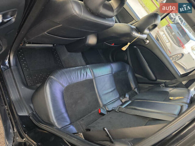 Чорний Міцубісі Аутлендер, об'ємом двигуна 2 л та пробігом 207 тис. км за 6900 $, фото 11 на Automoto.ua