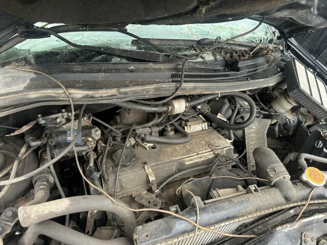 Черный Мицубиси Аутлендер, объемом двигателя 2.4 л и пробегом 240 тыс. км за 1999 $, фото 2 на Automoto.ua