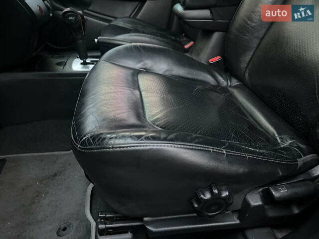 Чорний Міцубісі Аутлендер, об'ємом двигуна 2.38 л та пробігом 247 тис. км за 5499 $, фото 47 на Automoto.ua