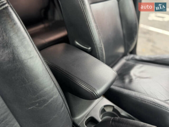 Черный Мицубиси Аутлендер, объемом двигателя 2.4 л и пробегом 242 тыс. км за 6800 $, фото 60 на Automoto.ua