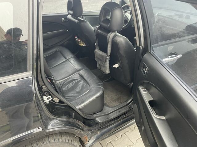 Черный Мицубиси Аутлендер, объемом двигателя 2.4 л и пробегом 234 тыс. км за 5499 $, фото 22 на Automoto.ua