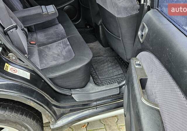 Черный Мицубиси Аутлендер, объемом двигателя 2.4 л и пробегом 167 тыс. км за 6150 $, фото 15 на Automoto.ua