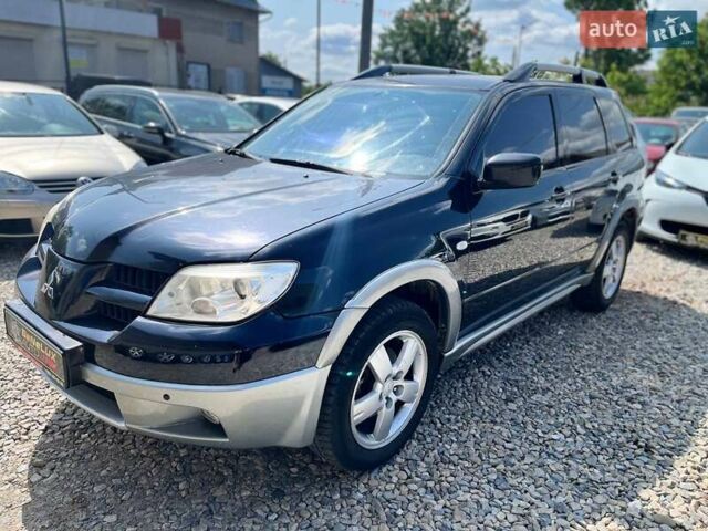 Черный Мицубиси Аутлендер, объемом двигателя 2.4 л и пробегом 270 тыс. км за 5999 $, фото 3 на Automoto.ua