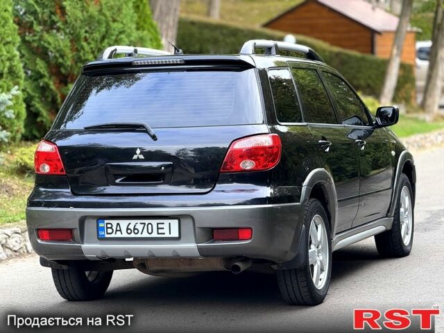 Міцубісі Аутлендер 2006 у Кропивницькому (Кіровограді) на Automoto.ua Чорний Міцубісі Аутлендер, об'ємом двигуна 2.4 л та пробігом 263 тис. км за 5999 $, фото 5 на Automoto.ua