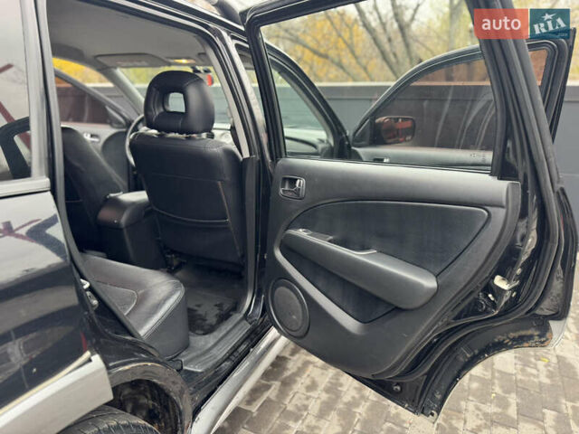 Черный Мицубиси Аутлендер, объемом двигателя 2.4 л и пробегом 242 тыс. км за 6800 $, фото 45 на Automoto.ua