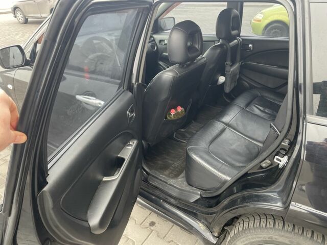 Черный Мицубиси Аутлендер, объемом двигателя 2.4 л и пробегом 234 тыс. км за 5499 $, фото 20 на Automoto.ua