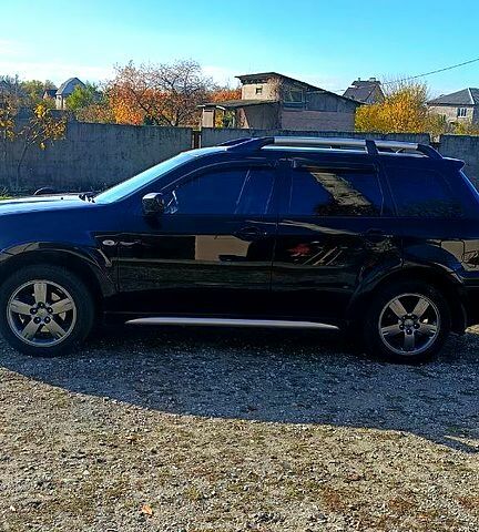 Міцубісі Аутлендер 2006 у Дніпро (Дніпропетровську) на Automoto.ua Чорний Міцубісі Аутлендер, об'ємом двигуна 2.4 л та пробігом 265 тис. км за 7500 $, фото 4 на Automoto.ua