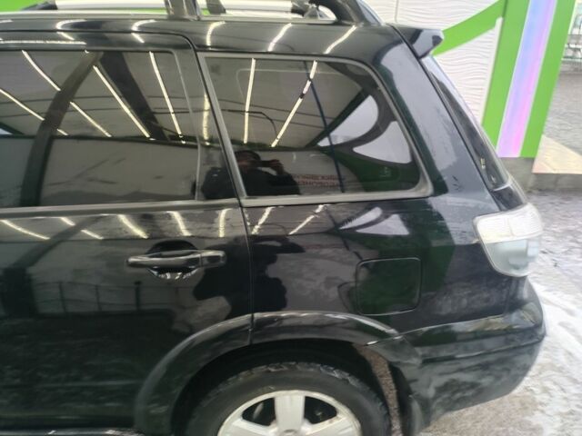 Чорний Міцубісі Аутлендер, об'ємом двигуна 2.4 л та пробігом 360 тис. км за 5200 $, фото 3 на Automoto.ua