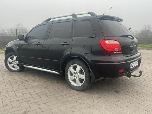 Чорний Міцубісі Аутлендер, об'ємом двигуна 2.4 л та пробігом 277 тис. км за 6700 $, фото 3 на Automoto.ua