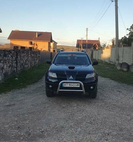 Міцубісі Аутлендер 2006 у Івано-Франківську на Automoto.ua Чорний Міцубісі Аутлендер, об'ємом двигуна 2 л та пробігом 263 тис. км за 7250 $, фото 3 на Automoto.ua