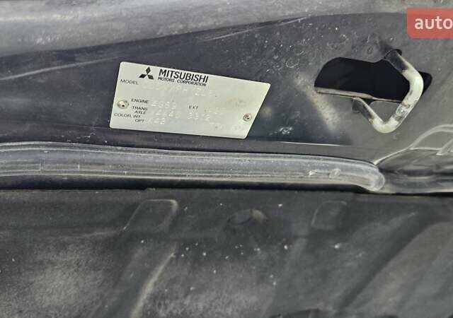 Черный Мицубиси Аутлендер, объемом двигателя 2.4 л и пробегом 167 тыс. км за 6150 $, фото 30 на Automoto.ua