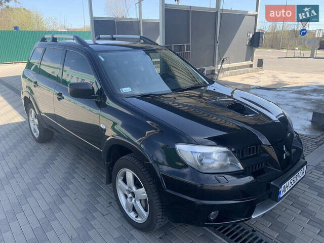 Черный Мицубиси Аутлендер, объемом двигателя 2 л и пробегом 212 тыс. км за 6000 $, фото 9 на Automoto.ua