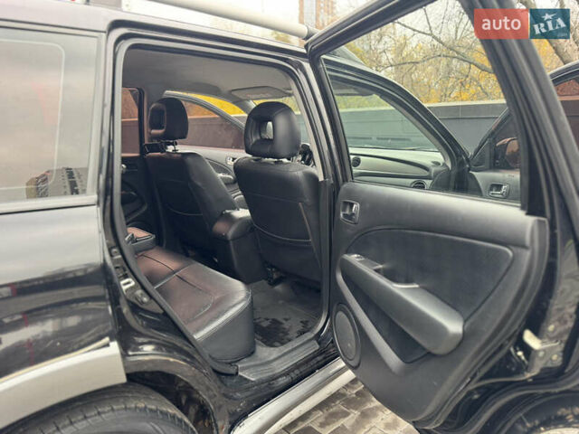 Черный Мицубиси Аутлендер, объемом двигателя 2.4 л и пробегом 242 тыс. км за 6800 $, фото 44 на Automoto.ua