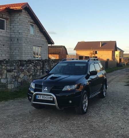 Міцубісі Аутлендер 2006 у Івано-Франківську на Automoto.ua Чорний Міцубісі Аутлендер, об'ємом двигуна 2 л та пробігом 263 тис. км за 7250 $, фото 12 на Automoto.ua