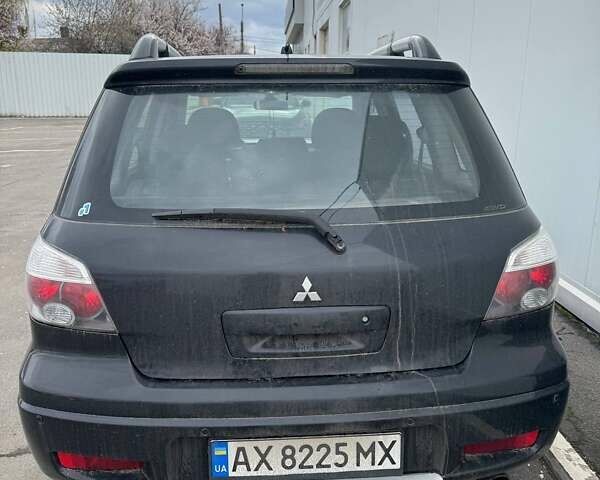 Черный Мицубиси Аутлендер, объемом двигателя 2.38 л и пробегом 260 тыс. км за 5000 $, фото 6 на Automoto.ua