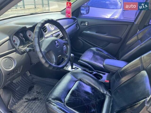 Черный Мицубиси Аутлендер, объемом двигателя 2.4 л и пробегом 270 тыс. км за 5999 $, фото 7 на Automoto.ua