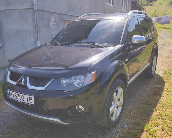 Чорний Міцубісі Аутлендер, об'ємом двигуна 2 л та пробігом 283 тис. км за 9000 $, фото 12 на Automoto.ua