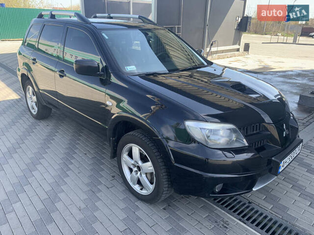 Черный Мицубиси Аутлендер, объемом двигателя 2 л и пробегом 212 тыс. км за 6000 $, фото 10 на Automoto.ua