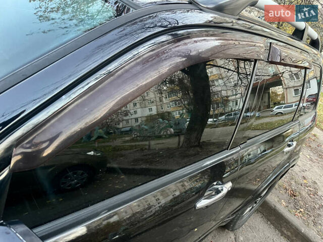 Чорний Міцубісі Аутлендер, об'ємом двигуна 2.38 л та пробігом 247 тис. км за 5499 $, фото 41 на Automoto.ua