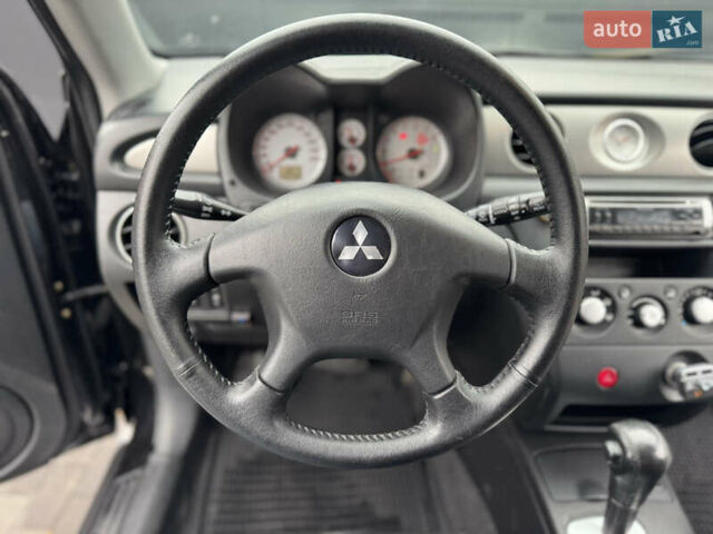 Черный Мицубиси Аутлендер, объемом двигателя 2.4 л и пробегом 242 тыс. км за 6800 $, фото 32 на Automoto.ua