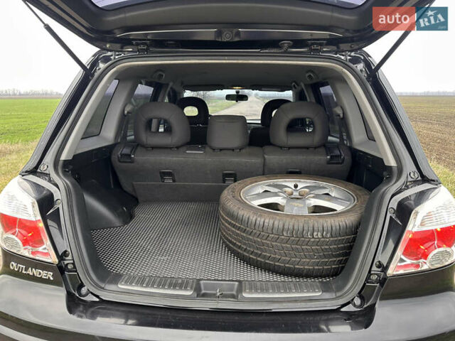 Черный Мицубиси Аутлендер, объемом двигателя 2 л и пробегом 230 тыс. км за 6300 $, фото 16 на Automoto.ua