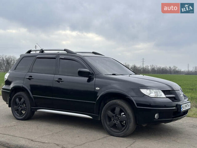 Черный Мицубиси Аутлендер, объемом двигателя 2 л и пробегом 230 тыс. км за 6300 $, фото 8 на Automoto.ua