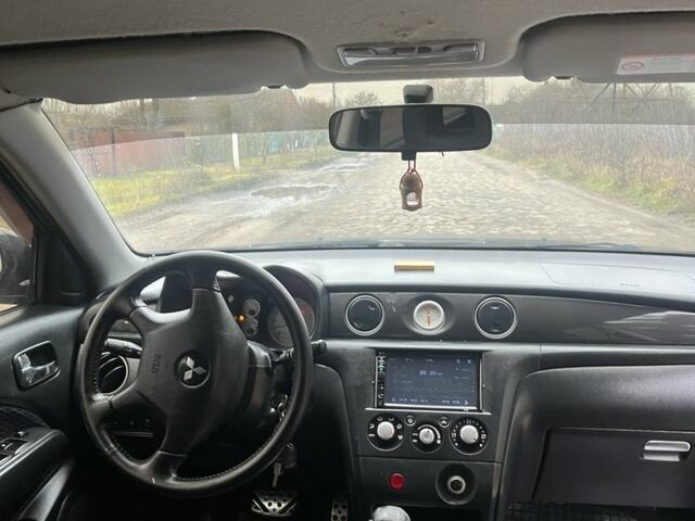 Черный Мицубиси Аутлендер, объемом двигателя 2.4 л и пробегом 310 тыс. км за 5300 $, фото 7 на Automoto.ua