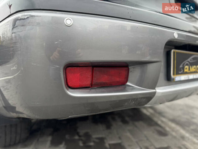 Черный Мицубиси Аутлендер, объемом двигателя 2.4 л и пробегом 242 тыс. км за 6800 $, фото 20 на Automoto.ua