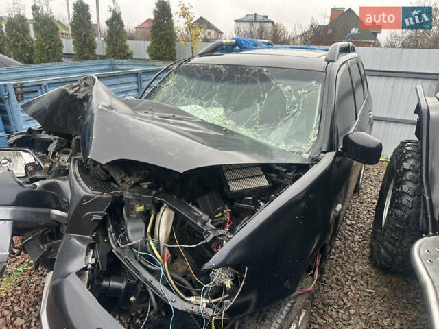 Черный Мицубиси Аутлендер, объемом двигателя 2.4 л и пробегом 240 тыс. км за 2200 $, фото 7 на Automoto.ua