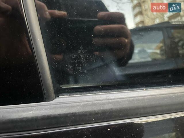 Чорний Міцубісі Аутлендер, об'ємом двигуна 2.38 л та пробігом 247 тис. км за 5499 $, фото 76 на Automoto.ua