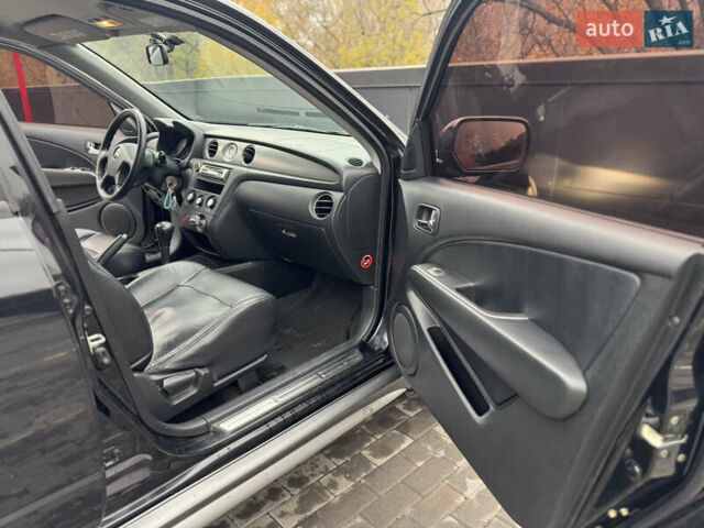 Черный Мицубиси Аутлендер, объемом двигателя 2.4 л и пробегом 242 тыс. км за 6800 $, фото 50 на Automoto.ua