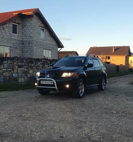 Міцубісі Аутлендер 2006 у Івано-Франківську на Automoto.ua Чорний Міцубісі Аутлендер, об'ємом двигуна 2 л та пробігом 263 тис. км за 7250 $, фото 13 на Automoto.ua