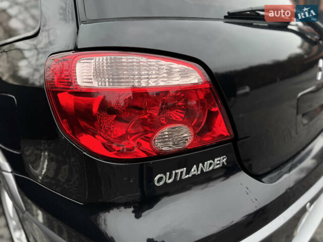 Черный Мицубиси Аутлендер, объемом двигателя 2.4 л и пробегом 242 тыс. км за 6800 $, фото 17 на Automoto.ua