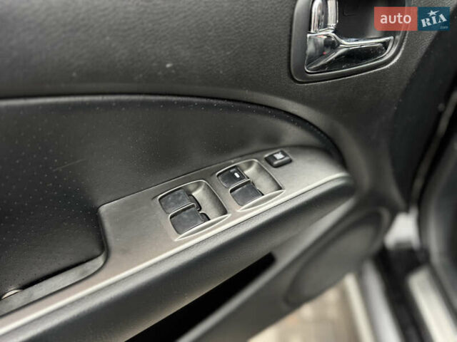 Черный Мицубиси Аутлендер, объемом двигателя 2.4 л и пробегом 242 тыс. км за 6800 $, фото 27 на Automoto.ua