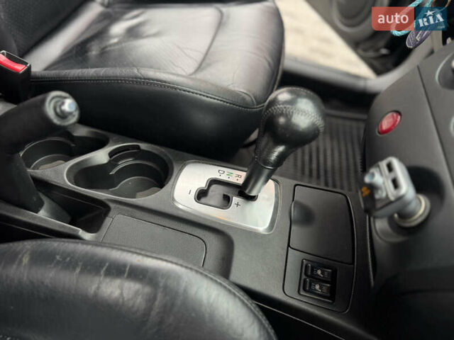 Черный Мицубиси Аутлендер, объемом двигателя 2.4 л и пробегом 242 тыс. км за 6800 $, фото 59 на Automoto.ua