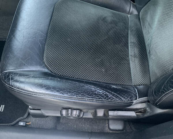 Черный Мицубиси Аутлендер, объемом двигателя 2 л и пробегом 212 тыс. км за 6000 $, фото 18 на Automoto.ua