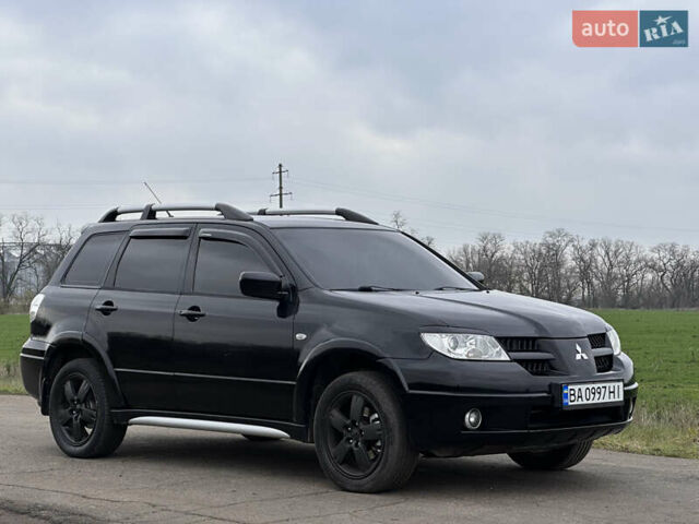 Черный Мицубиси Аутлендер, объемом двигателя 2 л и пробегом 230 тыс. км за 6300 $, фото 12 на Automoto.ua