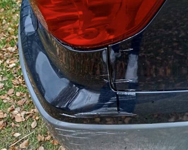 Чорний Міцубісі Аутлендер, об'ємом двигуна 2 л та пробігом 320 тис. км за 4500 $, фото 6 на Automoto.ua