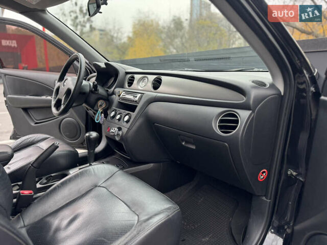 Черный Мицубиси Аутлендер, объемом двигателя 2.4 л и пробегом 242 тыс. км за 6800 $, фото 55 на Automoto.ua