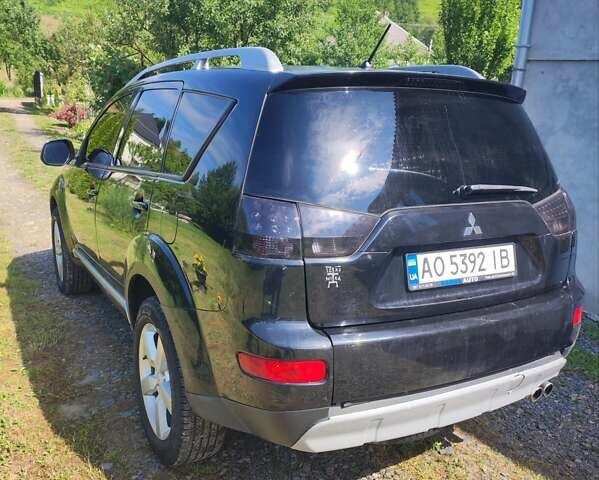 Чорний Міцубісі Аутлендер, об'ємом двигуна 2 л та пробігом 283 тис. км за 9000 $, фото 13 на Automoto.ua