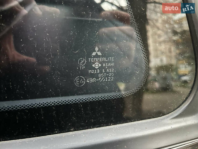 Чорний Міцубісі Аутлендер, об'ємом двигуна 2.38 л та пробігом 247 тис. км за 5499 $, фото 73 на Automoto.ua