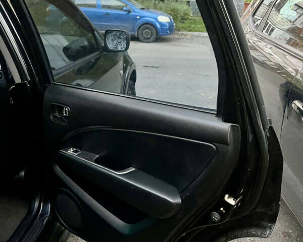 Чорний Міцубісі Аутлендер, об'ємом двигуна 2.38 л та пробігом 247 тис. км за 5499 $, фото 61 на Automoto.ua