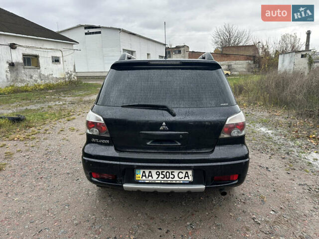Міцубісі Аутлендер 2006 у Василькове на Automoto.ua Чорний Міцубісі Аутлендер, об'ємом двигуна 2.38 л та пробігом 220 тис. км за 4300 $, фото 8 на Automoto.ua